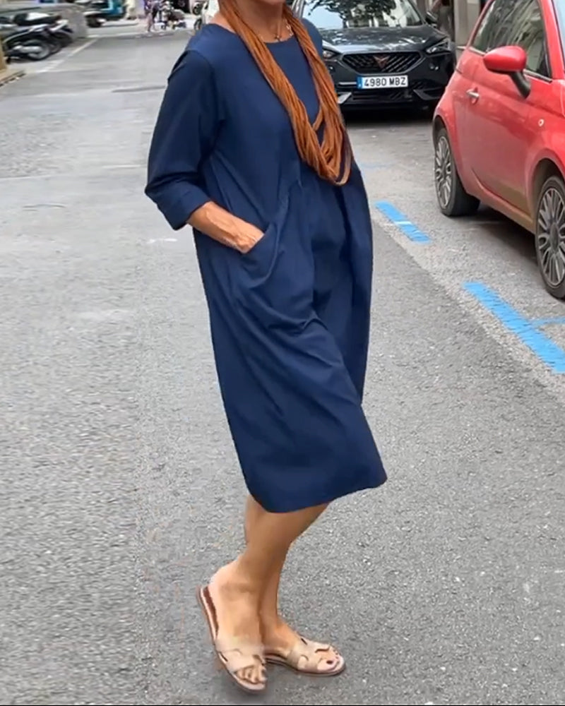 Round neck dress with pockets