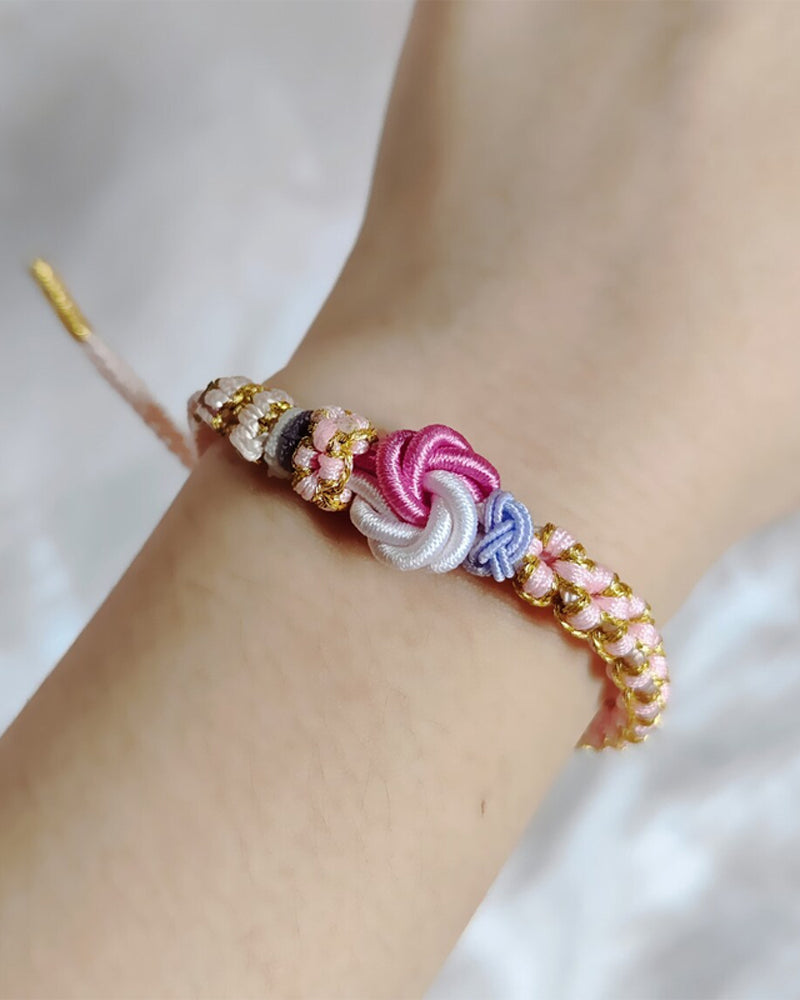 Bracelet with knot of peach blossoms