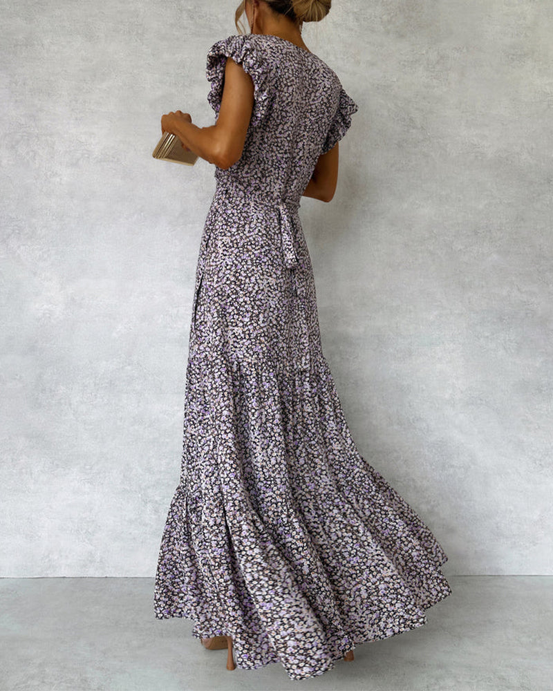 Elegant dress with ruffled sleeves and slit