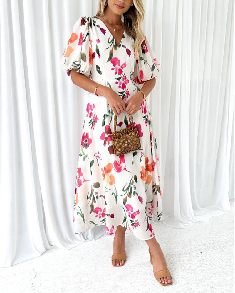Elegant dress with puff sleeves and floral print