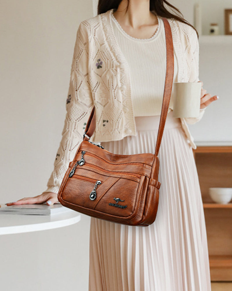 Multi-pocket soft leather crossbody bag