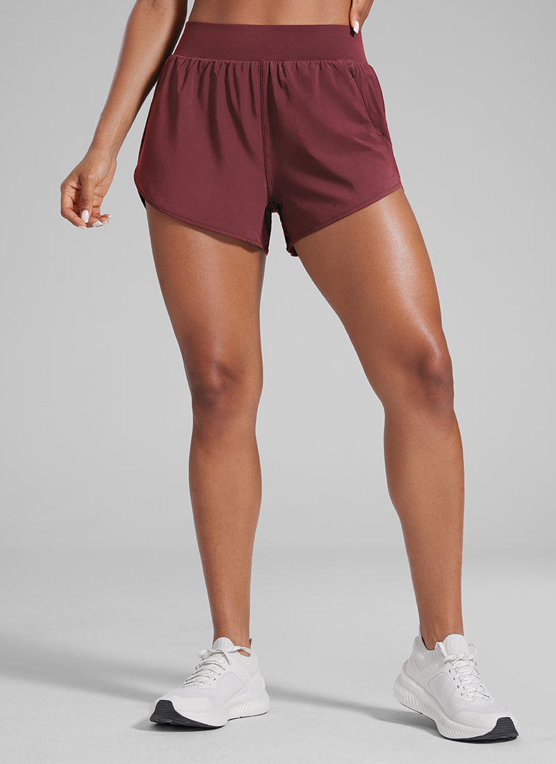 Feathery-Fit Soft Zipper Pocket Dolphin Short 3''