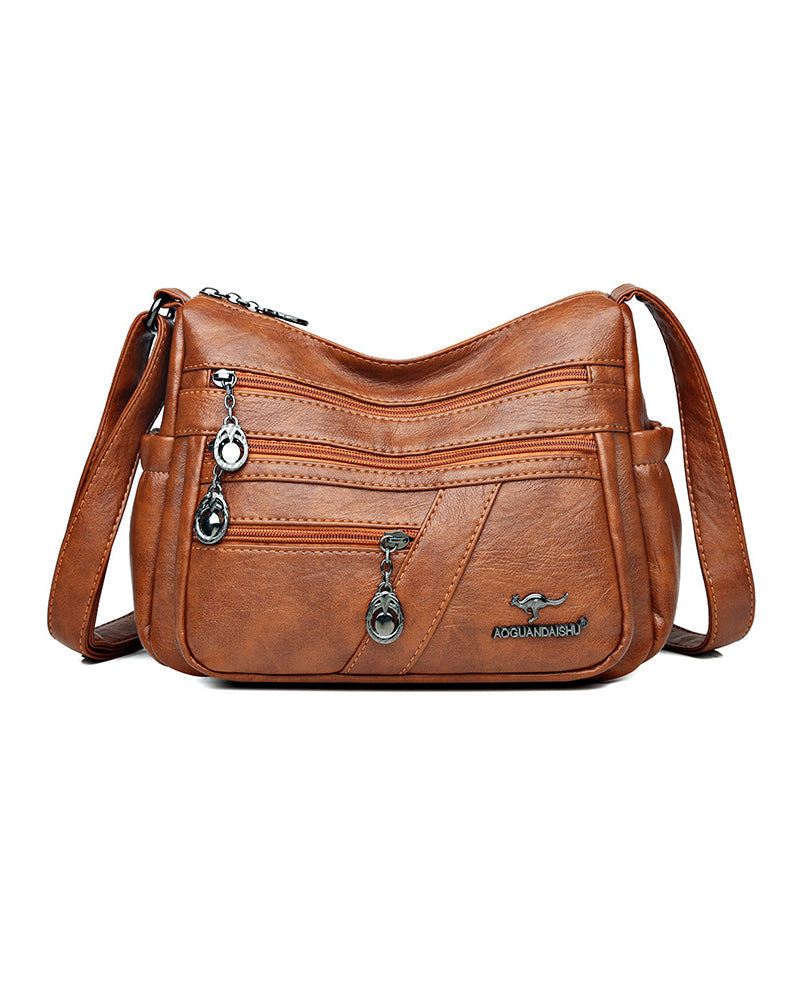 Multi-pocket soft leather crossbody bag
