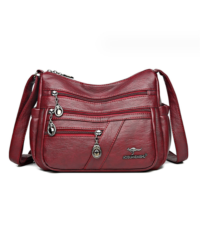 Multi-pocket soft leather crossbody bag